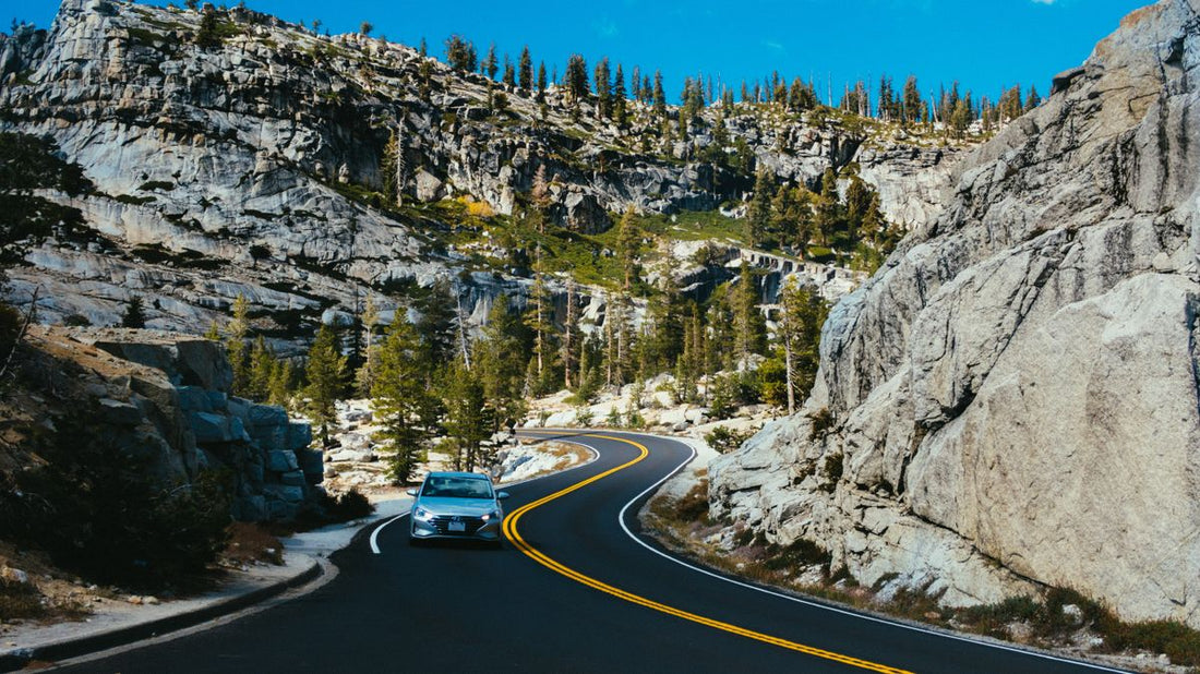 Car driving along a winding mountain road